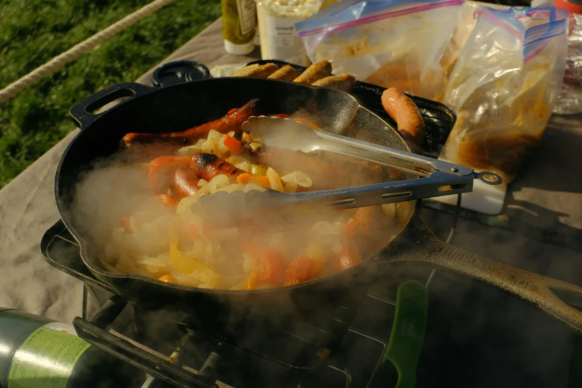 A wide pan of rice and vegetables cooked down together