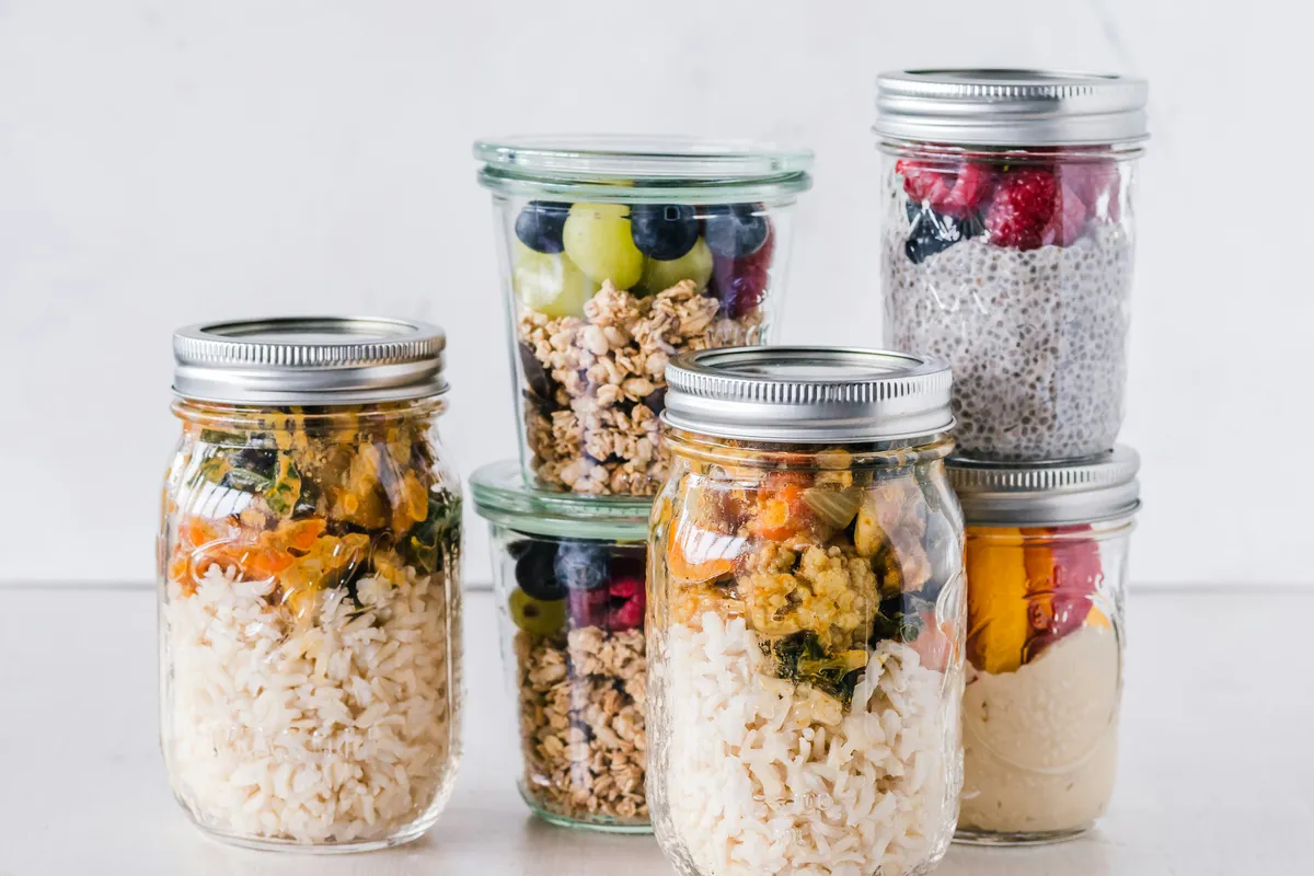Six filled jars standing in a row, the whole week accounted for